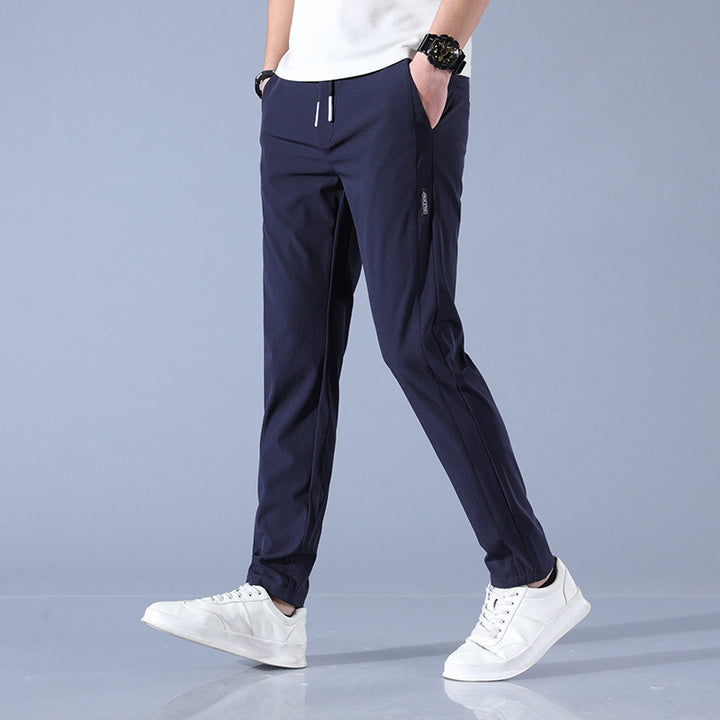 Men's sports pants with adjustable drawstring and zippered pockets on the sides Lune London