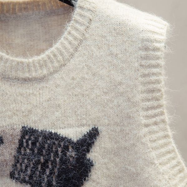 Gilet en tricot pour femmes avec motif tissé ludique Chic & Stil