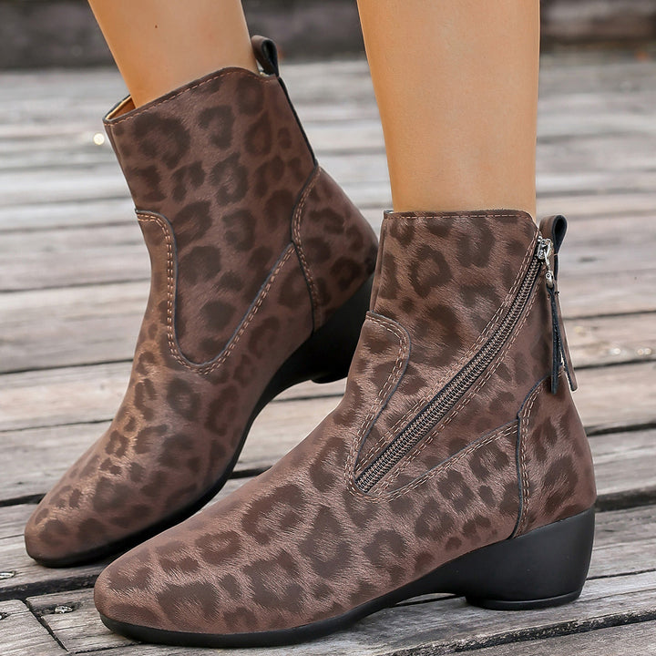 Elegant women's boots with animal print design and side zipper Lune London