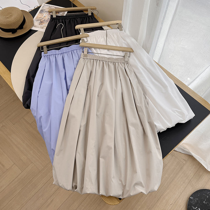 Jupe midi élégante pour femmes avec taille élastique et coupe volumineuse Chic & Stil