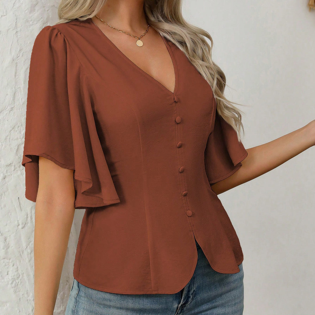 Women's elegant blouse with bell sleeves and button detail Lune London