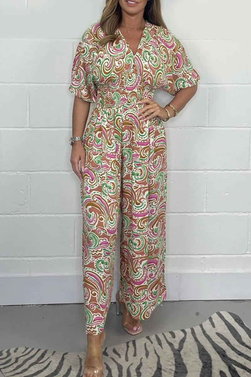 Lady Fluid jumpsuit with elegant paisley pattern and Lune London cinching