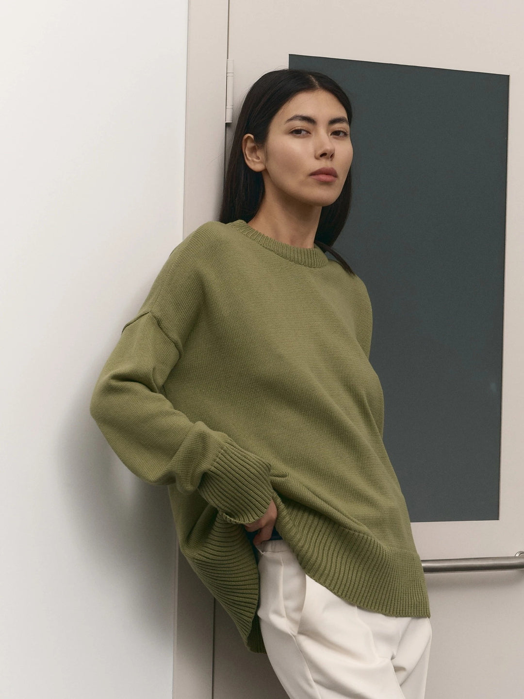 Casual knitted sweater for women with an innovative cut and wide sleeves Lune London