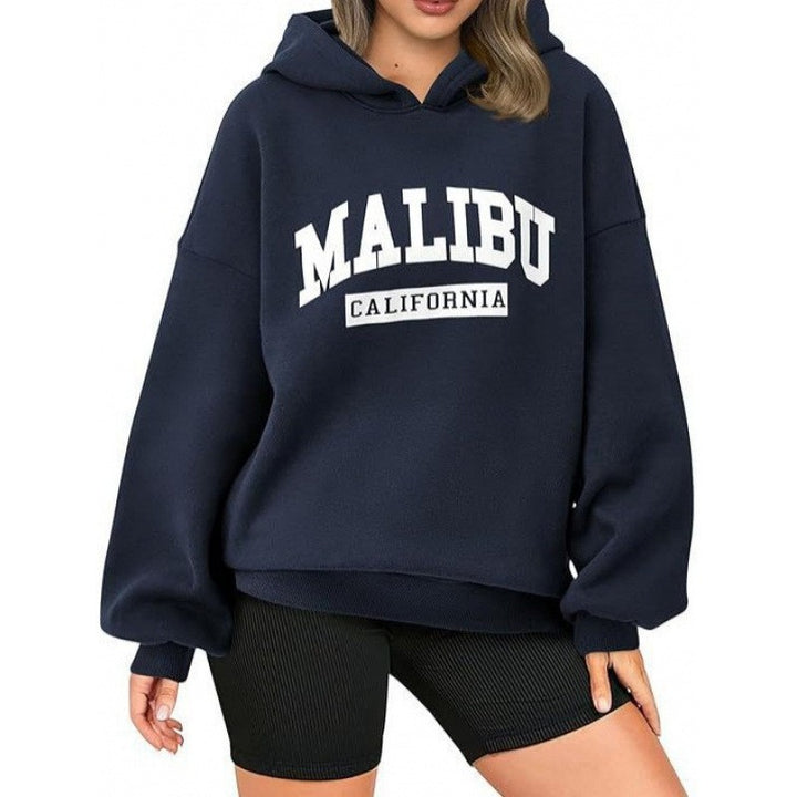 Women's casual hoodie with oversized cut and eye-catching print Chic & Stil