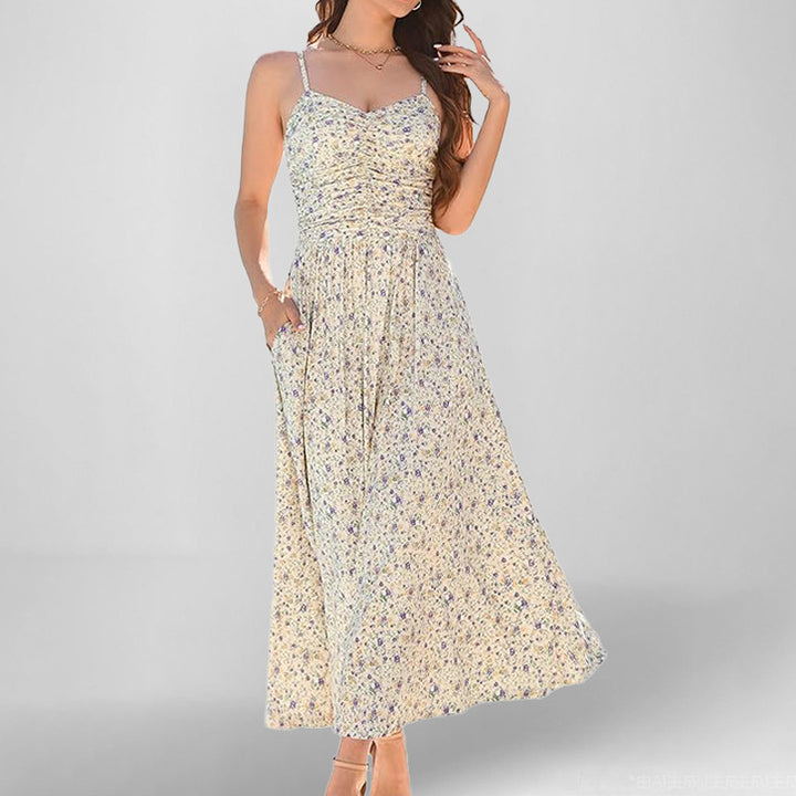 Robe maxi femme avec fines bretelles et poches latérales pratiques Chic & Stil