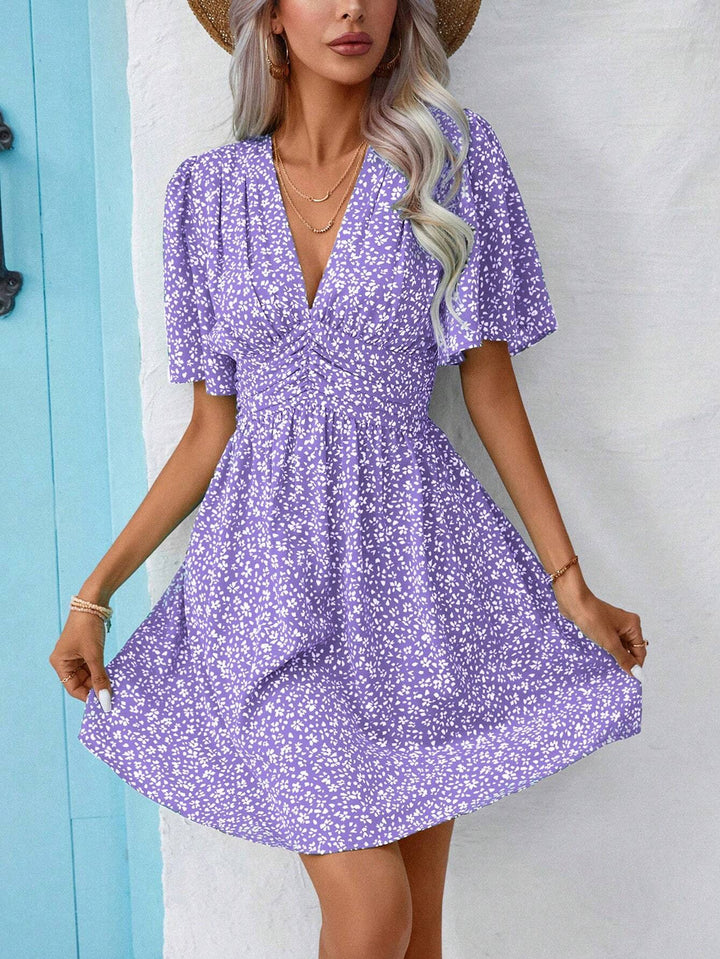V-neck dress with snowflake pattern for women with puff sleeves and elastic belt Lune London