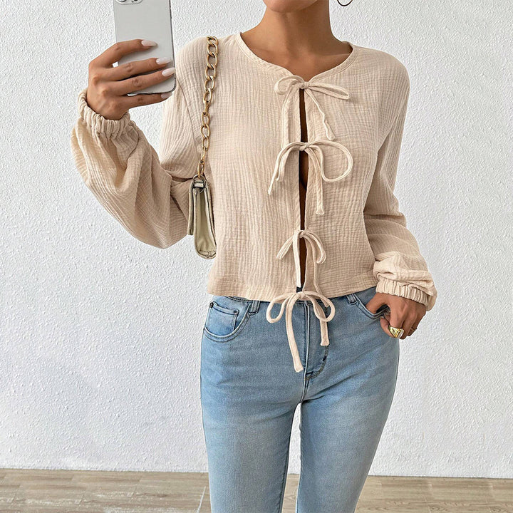 Short blouse top for women with sophisticated lace-up details Chic & Stil