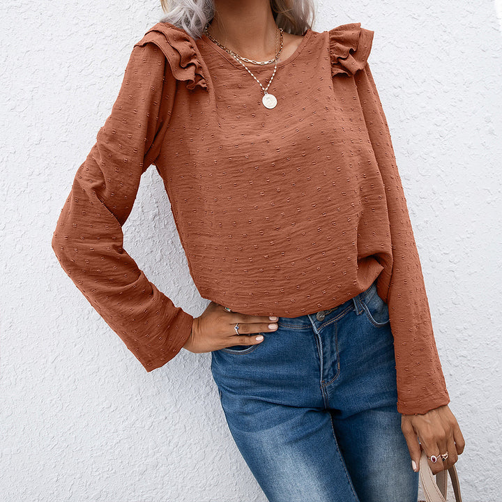 Casual women's top with ruffle details and textured surface Lune London