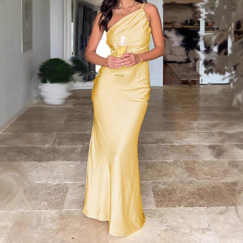 Elegant satin maxi dress for women with asymmetrical strap and refined ruffle details Lune London