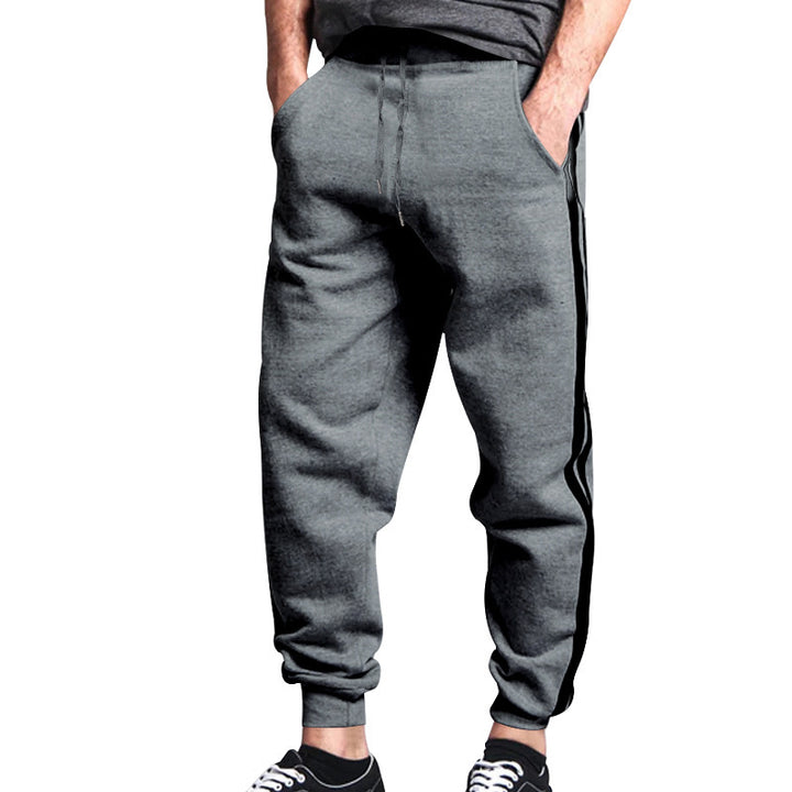 Sporty men's jogger pants with contrasting side stripes and an elastic waistband Lune London