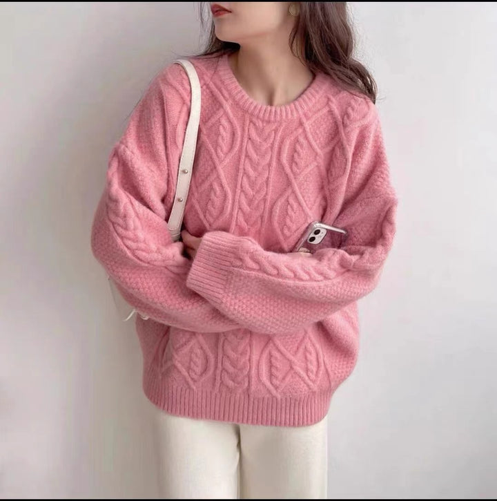 Oversized knitted sweater for women with cable knit pattern Lune London
