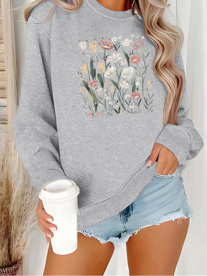 Sweatshirt pour femmes avec motif floral et coupe décontractée Chic & Stil