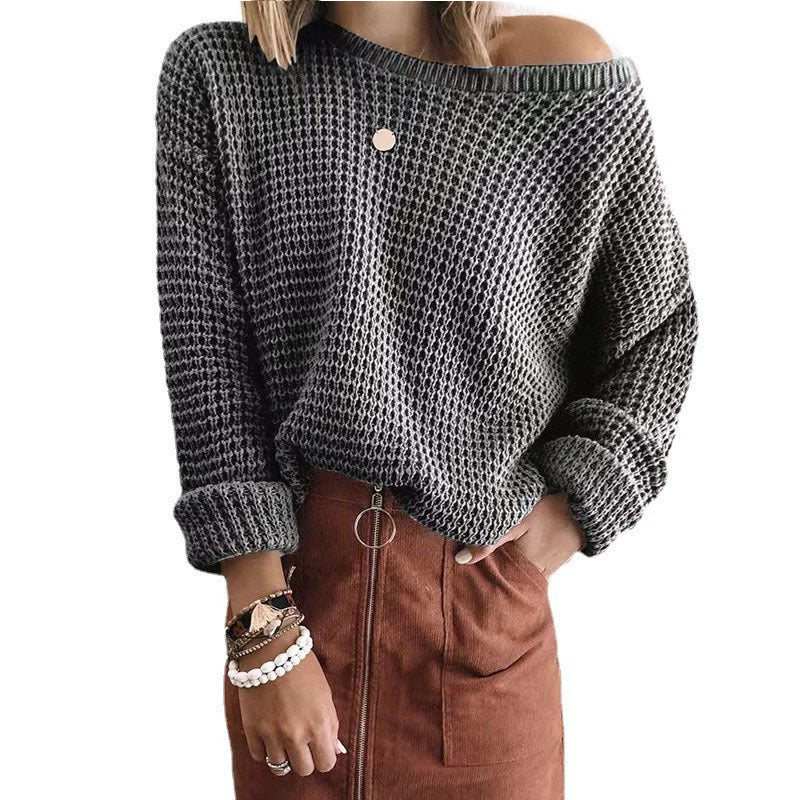 Oversized casual style knitted sweater for women with an off-shoulder design.