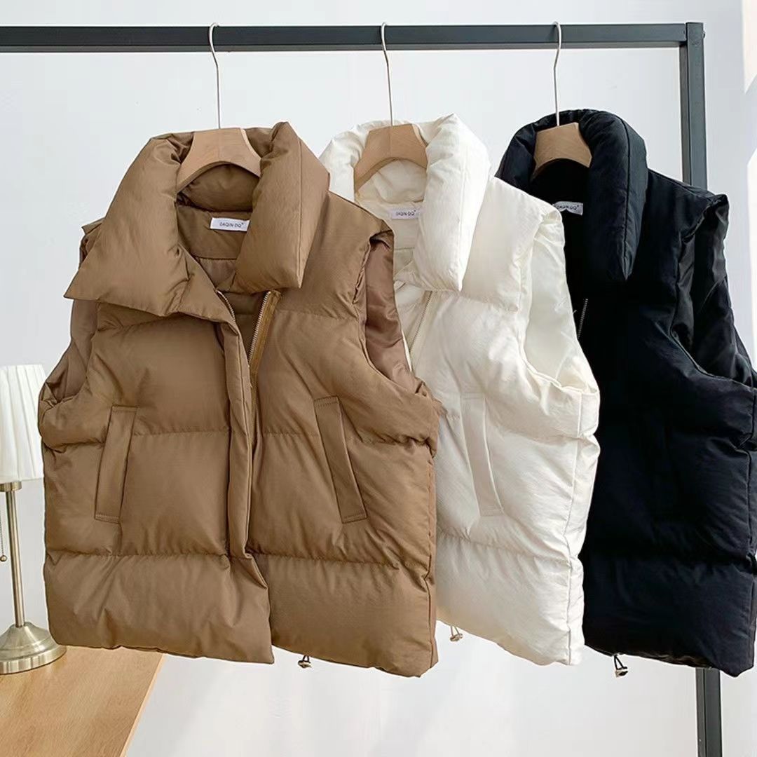 Ladies quilted vests with high collar and practical side pockets Lune London