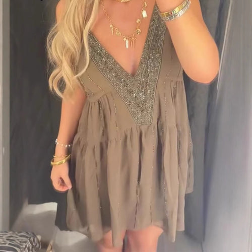 Summer dress for women with an elegant V-neckline and refined ruffle details Lune London