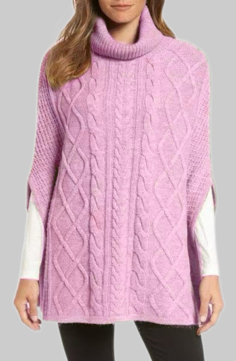 Knitted poncho for women with high collar and classic cable knit pattern Lune London