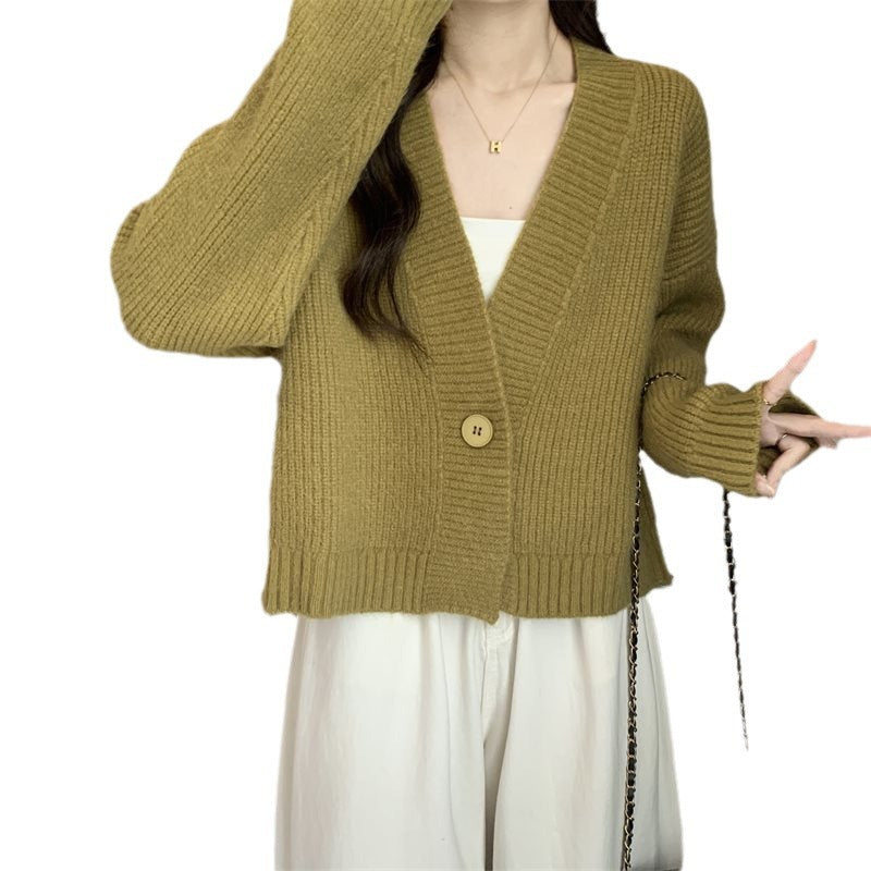 Cardigan tendance femme avec décolleté en V profond et fermeture à boutons Chic & Stil