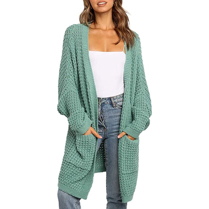 Knitted cardigan for women with a relaxed fit and pockets Lune London