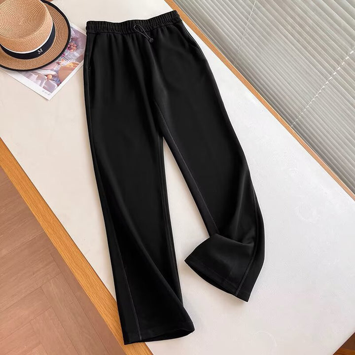 Pantalons de loisirs sportifs pour femmes avec taille élastique et poches latérales Chic & Stil