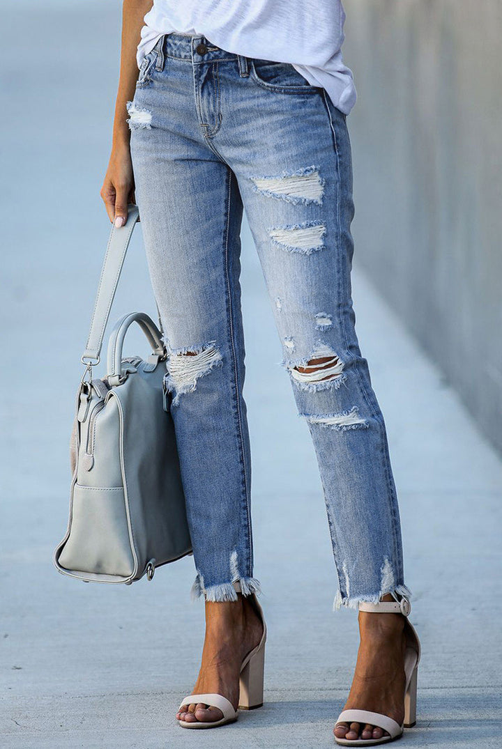 Destroyed jeans for women in a casual boyfriend style with frayed hems Lune London