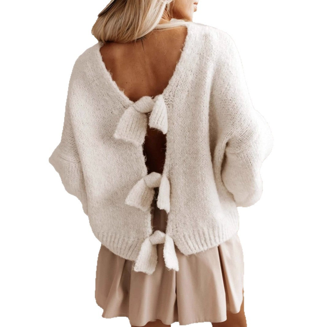 Casual knitted sweater for women with deep cut in the back and bow details Lune London
