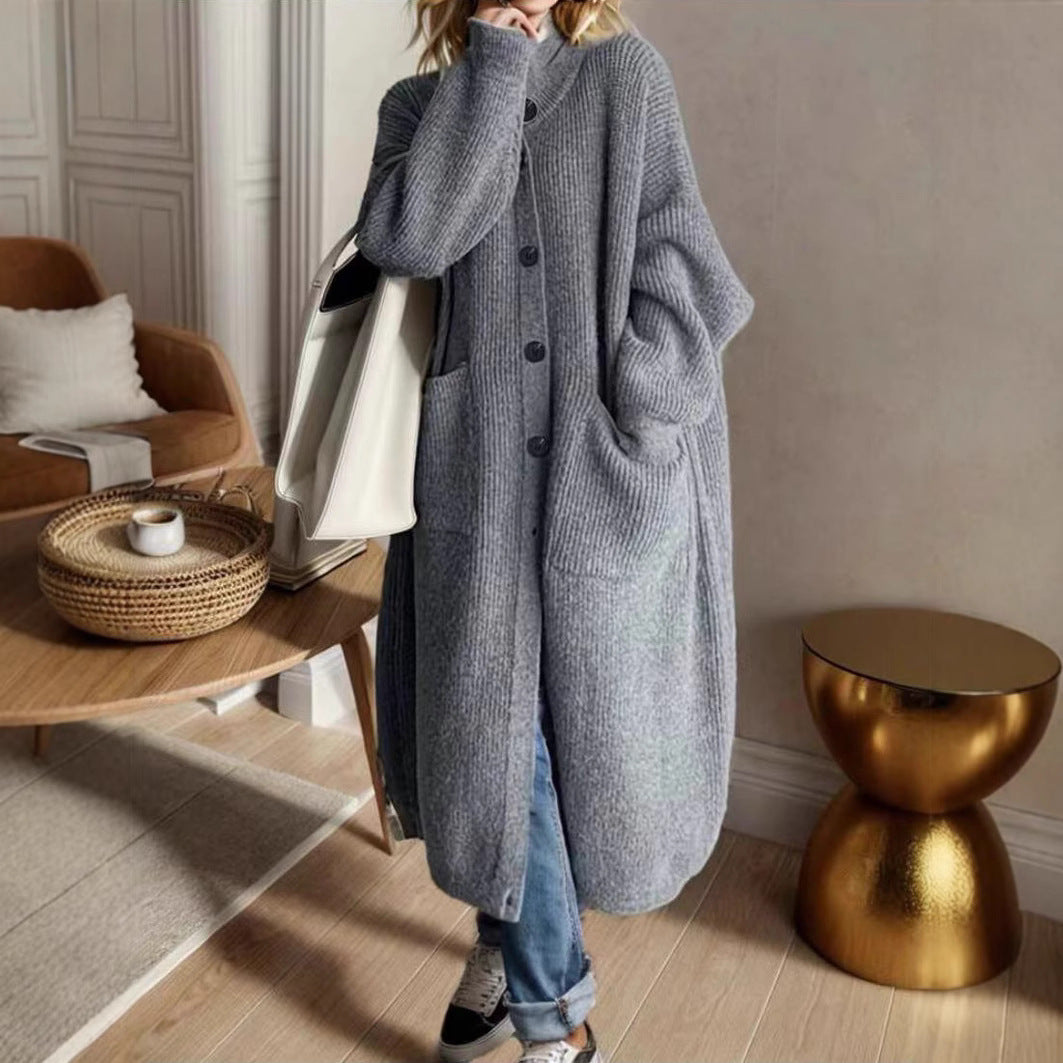 Trendy knitted jacket for women with generous pockets and chic button detail