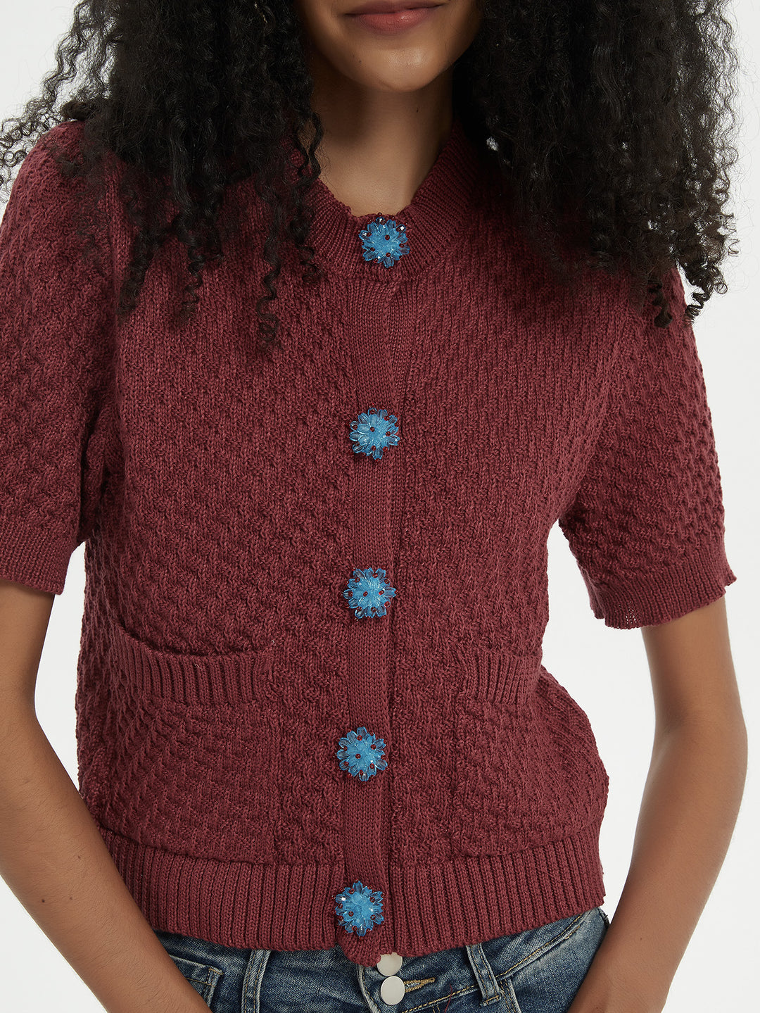 Knit jacket for women with an elaborate textured pattern and decorative buttons Lune London
