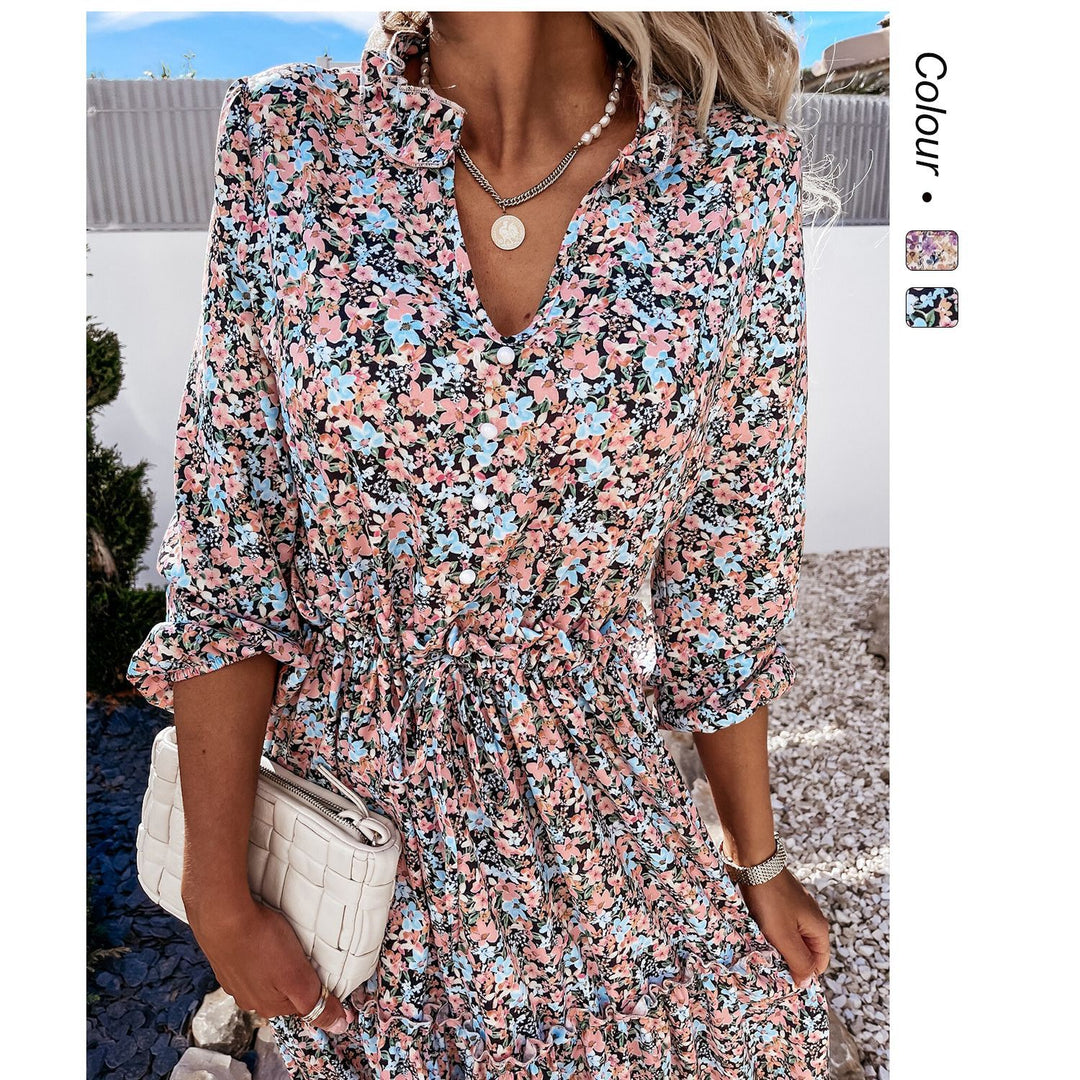 Women's floral dress with playful ruffle details and knee-length cut
