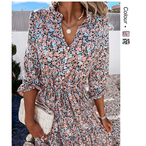 Women's floral dress with playful ruffle details and knee-length cut