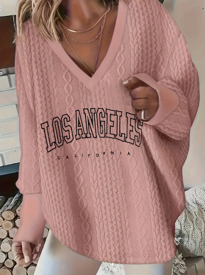 Pull décontracté à col en V pour femmes avec motif en cable Chic & Stil