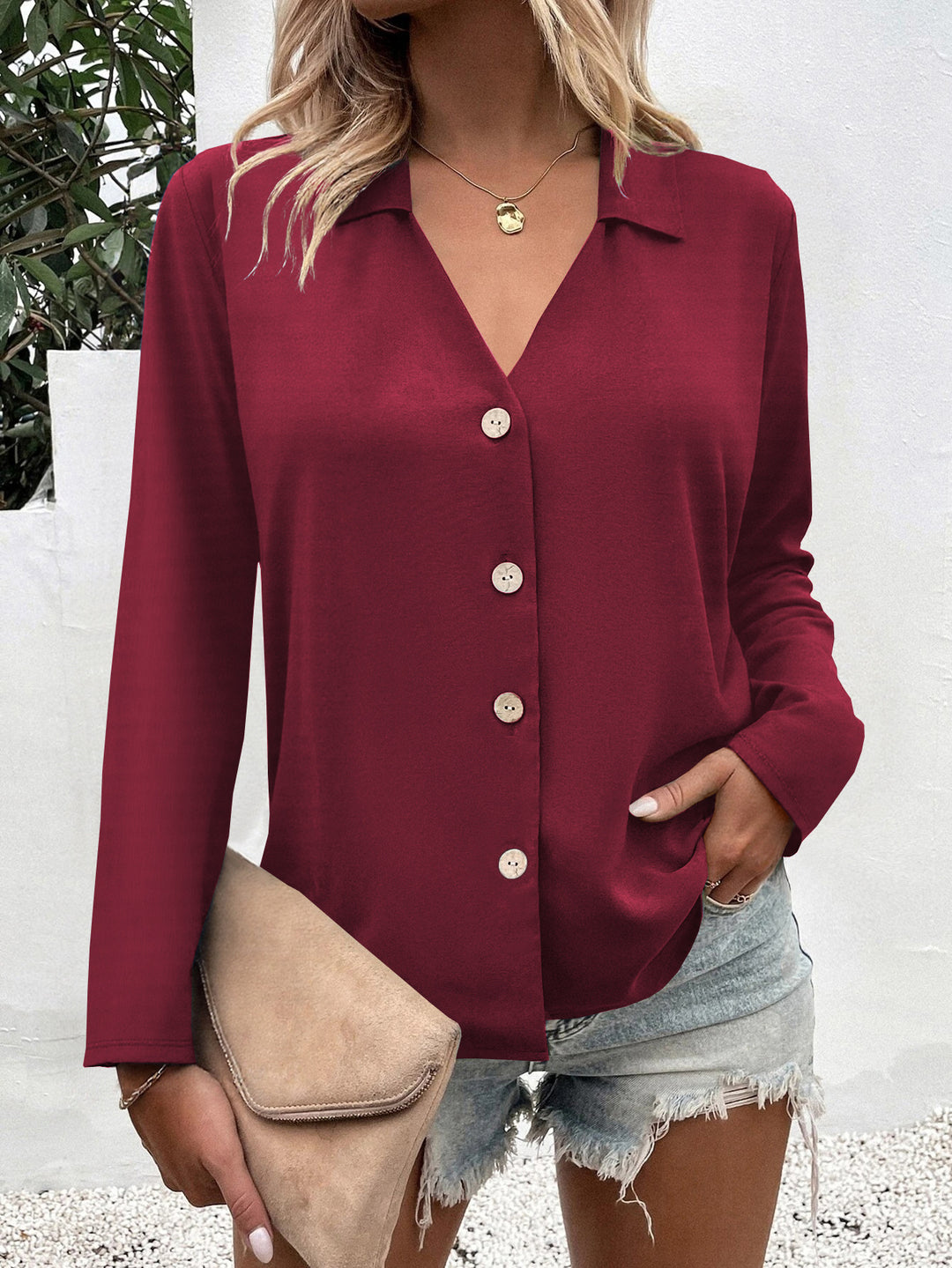Trendy women's blouse with V-neck and button details Lune London