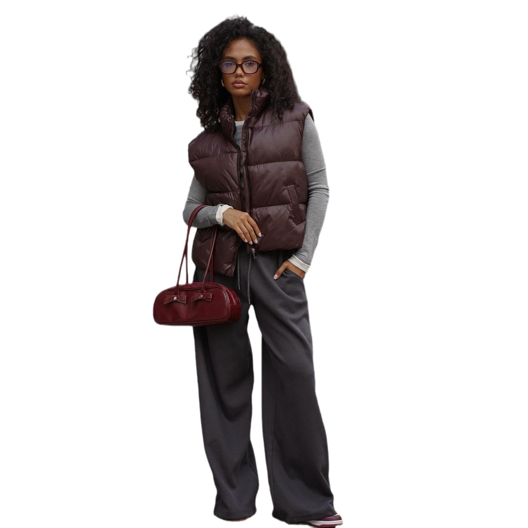 Quilted women's vest with high collar and practical zipper Lune London