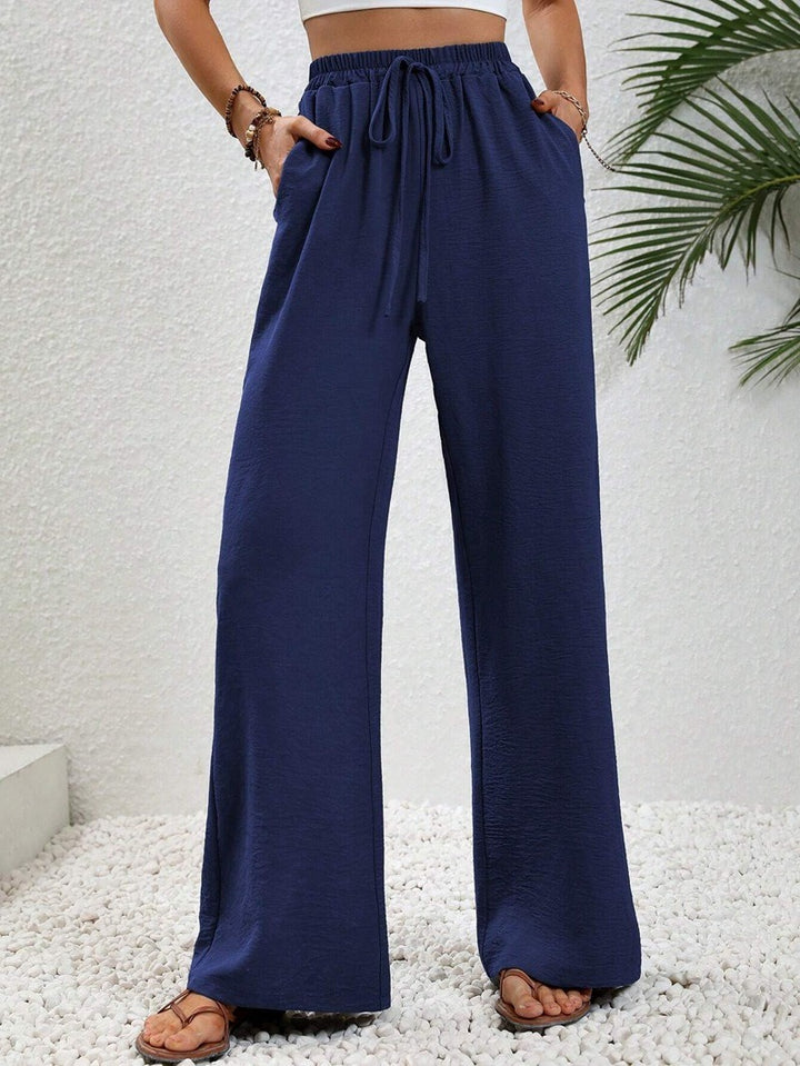 Casual palazzo pants for women with elastic waistband and practical pockets Lune London