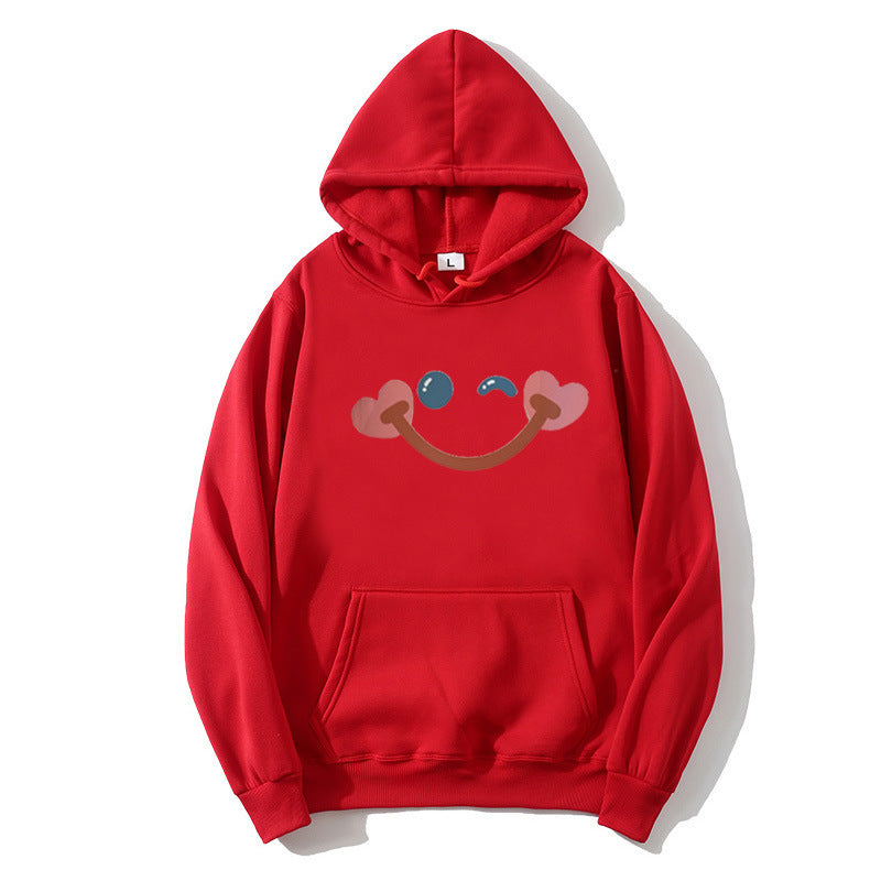 Women's hoodie with cheerful smiley design Chic & Stil