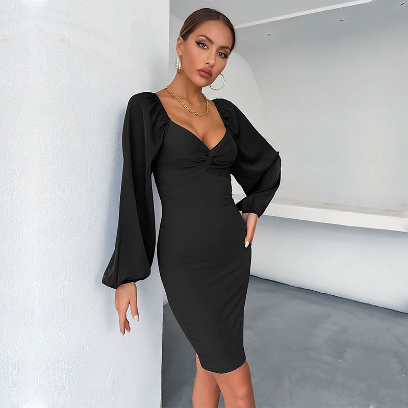 Fitted dress for ladies with puff sleeves and ruching Lune London