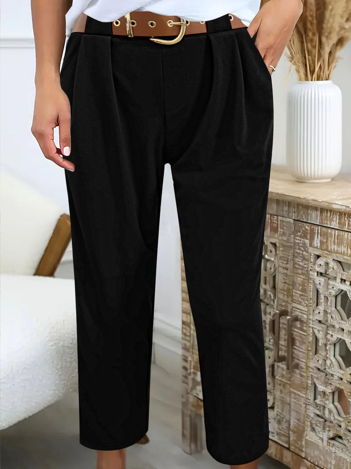 Elegant high-waisted pants for women with decorative pleats and practical pockets Lune London