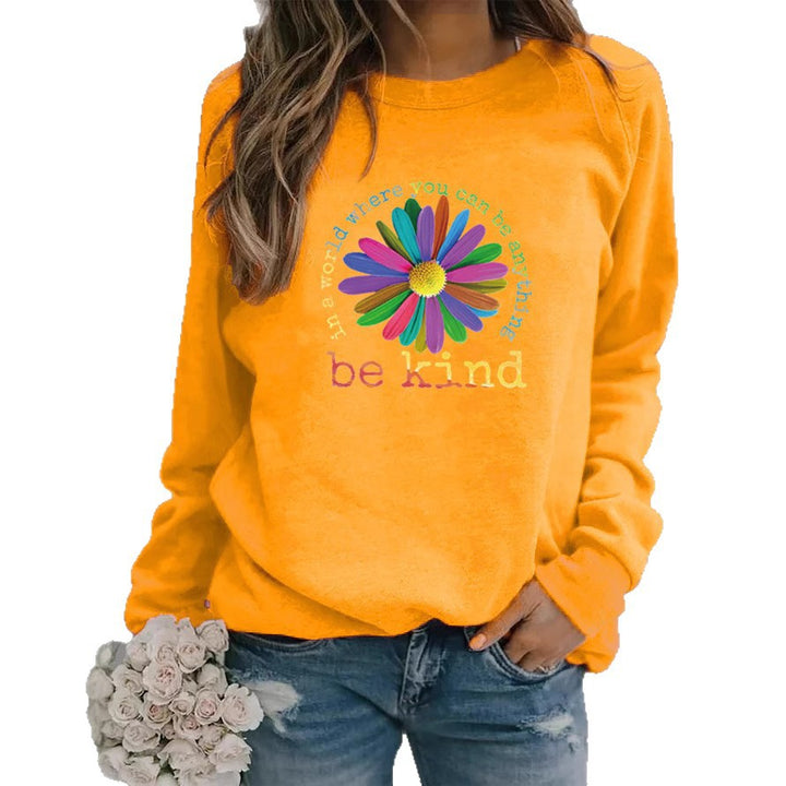 Sweatshirt pour femmes avec un design floral motivant coloré et un intérieur doux Chic & Stil