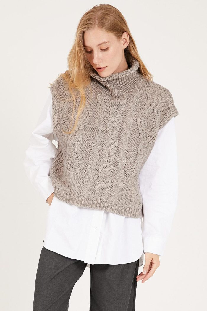 Trendy knitted sweater for women with high collar and cable knit pattern Lune London