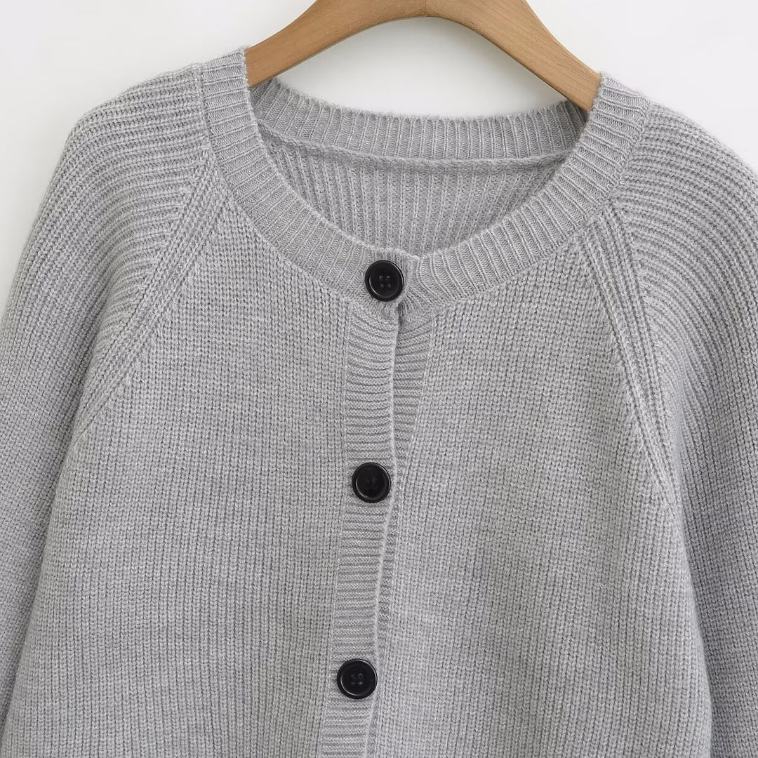 Ladies cardigan with fringed edges and button details Lune London