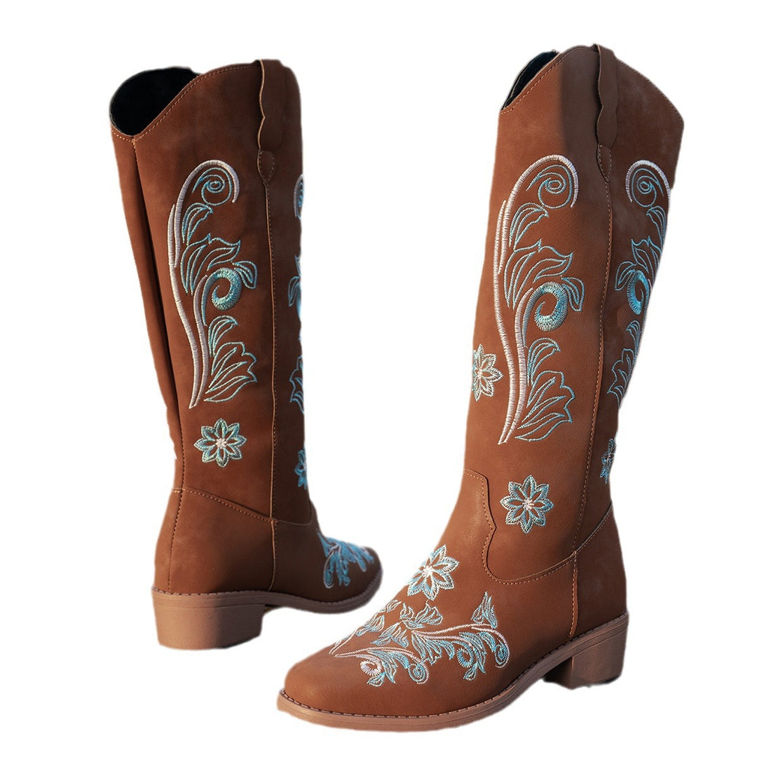 Women's cowboy boots with handmade floral details and a comfortable block heel Lune London