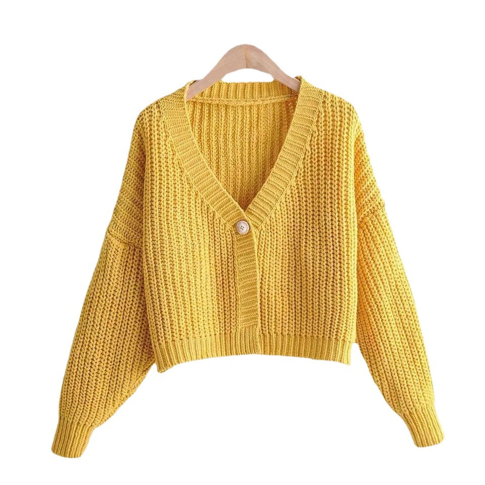 Ladies short cardigan with deep V-neck and special button details Lune London