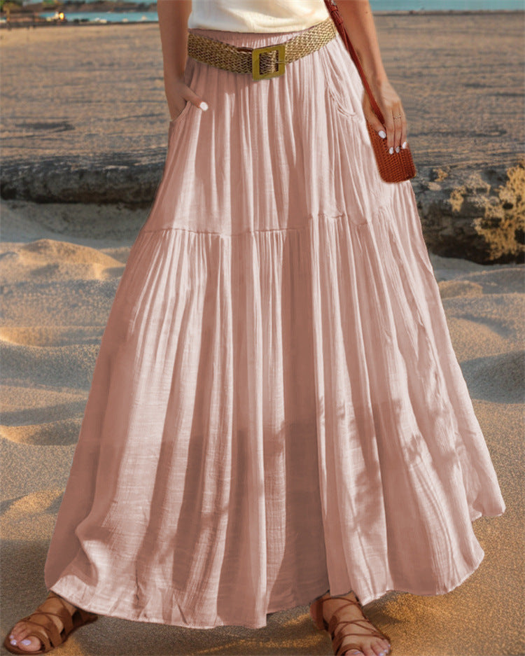 Maxi flared skirt for women with elegant pleated draping and practical pockets Lune London