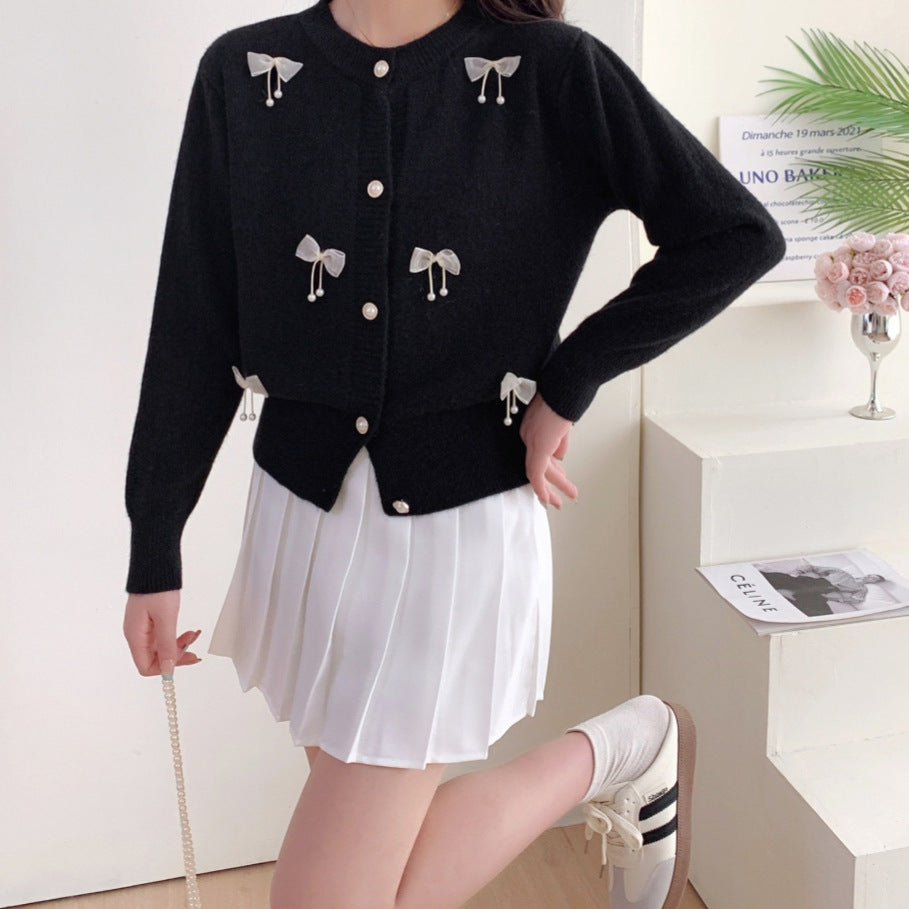 Knitted jacket for women with lace embellishments and button details Lune London