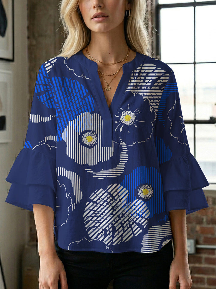 Ladies elegant blouse shirt with voluminous puff sleeves and graphic floral design Lune London