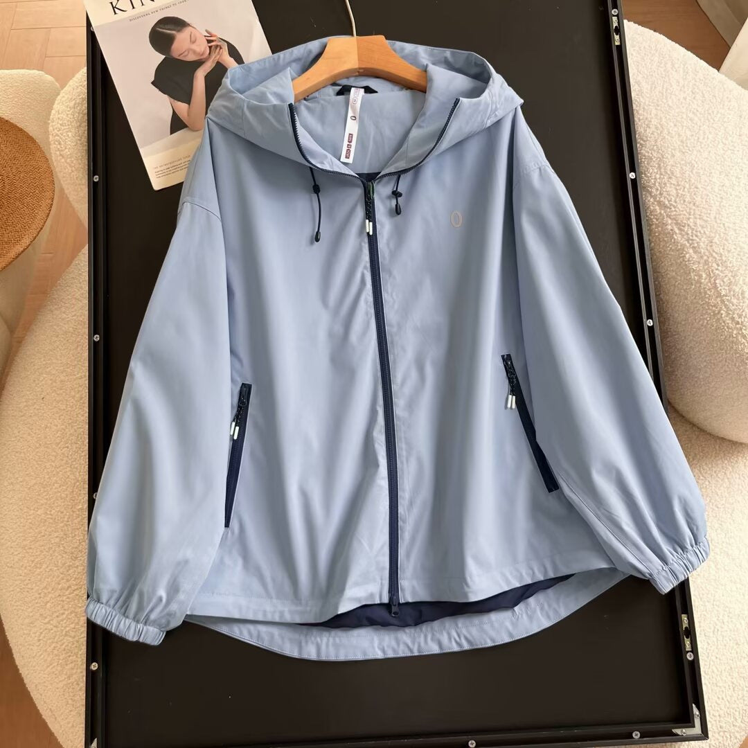 Veste coupe-vent légère pour femmes avec poches zippées sur les côtés Chic & Stil