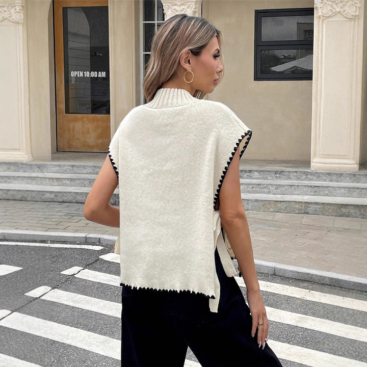 Knit top for women with unique cutouts and a playful knot Lune London