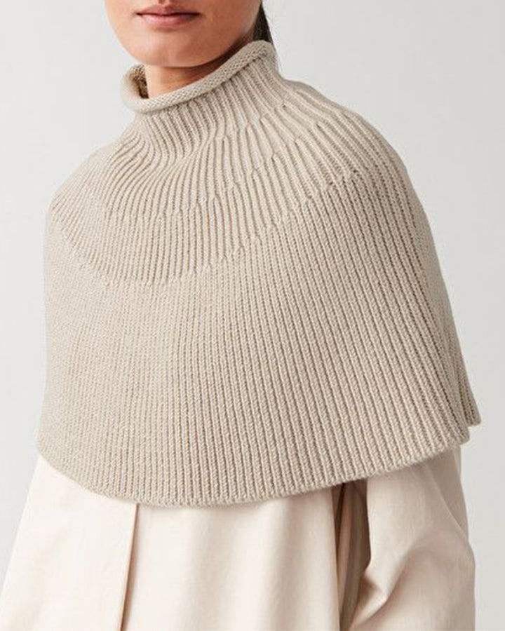 Knitted cape for women with high collar and fine rib structure Lune London
