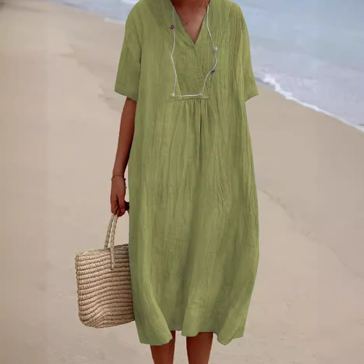 Casual beach dress for women with V-neck and wide hem Lune London