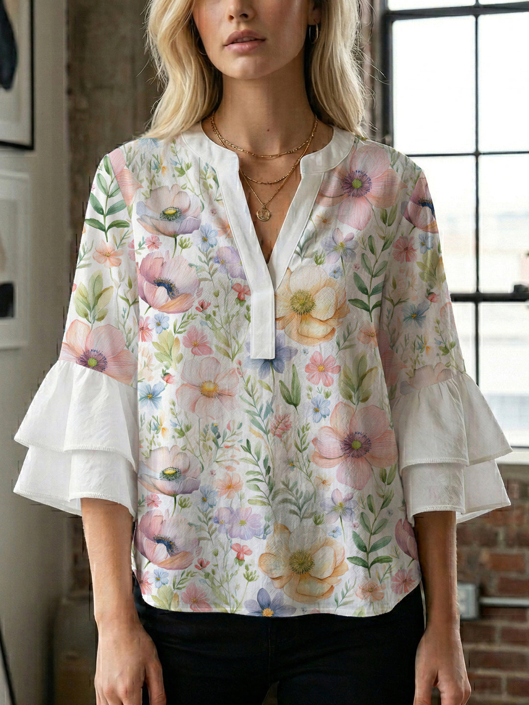 Ladies elegant top with voluminous ruffle hems and floral design Lune London