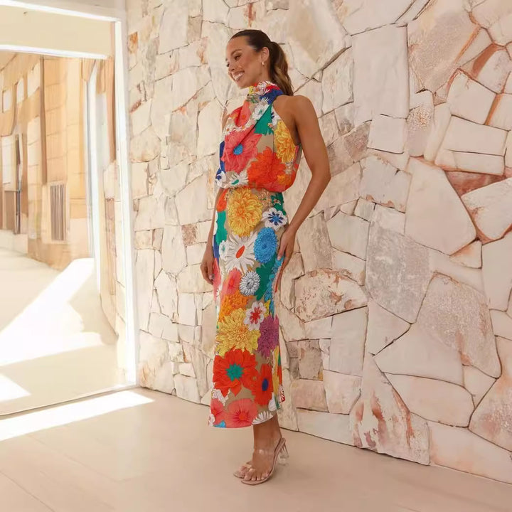 Ladies max dress with creative floral design and playful neckholder